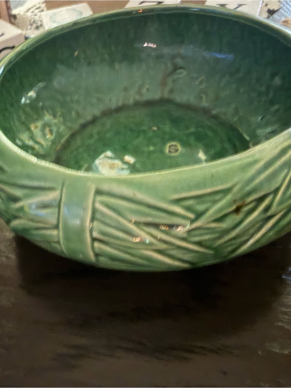 Vintage green McCoy pottery planter featuring a bamboo or basketweave design.